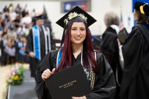 Nicole Kreischer '26, Senior Class President, receiving her diploma during the Bachelor's Degree Ceremony at Mount Saint Mary College on Saturday, May 16, 2026