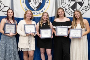 Five women holding up awards. Left to right: Kate Egan of Levittown, N.Y., recipient of the Father Michael J. Gilleece Memorial Award; Nicole Kreischer of Washingtonville, N.Y., recipient of the Mount Saint Mary College Award; Sabrina Scire of Staten Isla