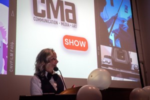 Woman stands at podium at Mount Saint Mary College.