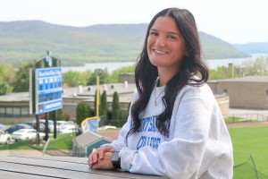 Woman on bench. Dana Donnelly of Yulan, N.Y., and Education student at Mount Saint Mary College, will graduate on Saturday, May 16. 