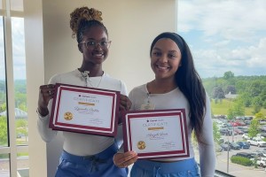 Mount Saint Mary College nursing students Djenaba Balde (left) and Aniyah Lewis (right) display their certificates of completion following the 2025 Nurse Extern Program at Garnet Health Medical Center. 