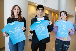 Mount Saint Mary College students (left to right) Emily Hadden of Newburgh, N.Y.; Esteban Meza of Montgomery, N.Y.; and Lucian Forte of New Windsor, N.Y. show off their winning designs for the 2026 Habitat for Humanity of Greater Newburgh Walk for Housing