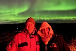 Mount Saint Mary College professors Jen Bready and Michael Fox stand beneath the Northern Lights during a winter break trip to Iceland.