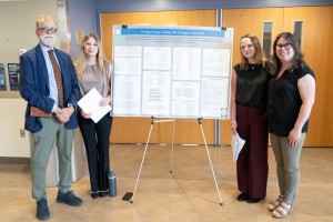 Mount Saint Mary College’s Brooke Simmons (left) and Kaitlyn Pazereckis (right), Criminology students from Hopewell Junction, N.Y., discuss their work for Vision Hudson Valley’s 2025 Quality of Life Report Card during a recent symposium for student resear