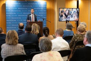 Evan Merkhofer, Vice President for Academic Affairs at Mount Saint Mary College, addresses an audience of about 75 local leaders, alumni, and friends of the college at the recent “Climbing Higher: Meet the Leaders of the Mount” event. 