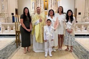 Men and women stand in a church at Mount Saint Mary College. (left to right) Jessica Joy Guelberg; Fr. Gregoire Fluet, Vice President for Mission and Ministry and Campus Chaplain; Maegan Orona; Zoe O’Brien; Mila Zangl ’22, and Bishop Dunn student Patrick 