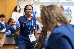 Girl smiles. An image from last year’s Summer Institute: Nursing Exploration program at 91��ý Saint Mary College. Rising high school juniors and seniors are invited to apply to this year’s program. The deadline is Friday, June 5. 