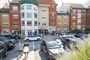 Freshman students move into Sakac Hall at Mount Saint Mary College on Saturday, August 22. The Mount’s freshman enrollment is up 20 percent this year. In the foreground, Education major James Gwiazdoski of Woodbury, Conn. prepares to move into his room wi