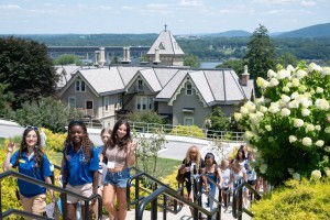 ALT: Students climb the stairs at Mount Saint Mary College.