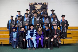 Smiling people at a graduation. 
