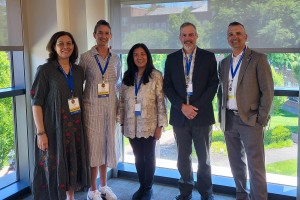 Mount Saint Mary College’s Marie-Therese Sulit, professor of English (center) with colleagues from Molloy University and Albertus Magnus College. Sulit explored the frontiers of technology with her paper, “Doce Me Veritatem: Conversations about AI.” Alt: 