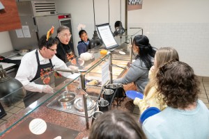 Dr. Robert Gervasi, President of Mount Saint Mary College (left), and Fr. Gregoire Fluet, Vice President for Mission and Ministry and Campus Chaplain, served up great food and appreciative smiles on Monday, November 17. 