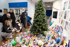 Mount Saint Mary College students and staff sort and bag hundreds of toys collected during the college’s annual Christmas drive. The community gathered more than 1,000 gifts to support local children.