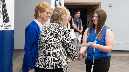 Student receiving award