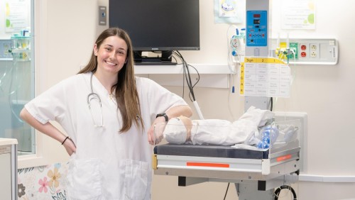 Nursing student in lab with SIM patient