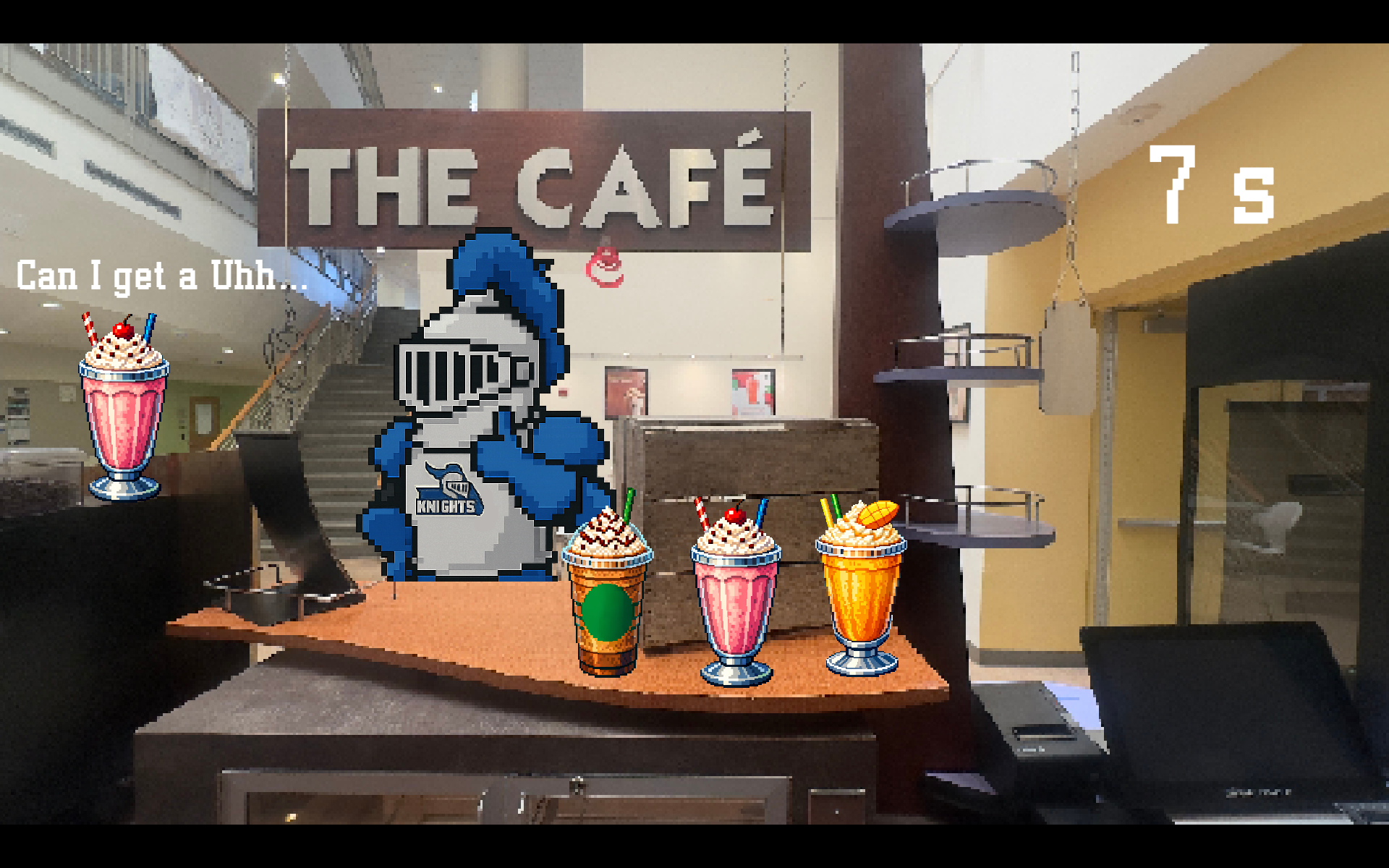 A pixel art video game screen set in a real-life campus caf&eacute; called "THE CAF&Eacute;," featuring a blue knight mascot standing behind a counter with three milkshakes/smoothies, while a thought bubble reads "Can I get a Uhh..." and a timer shows "7 s."