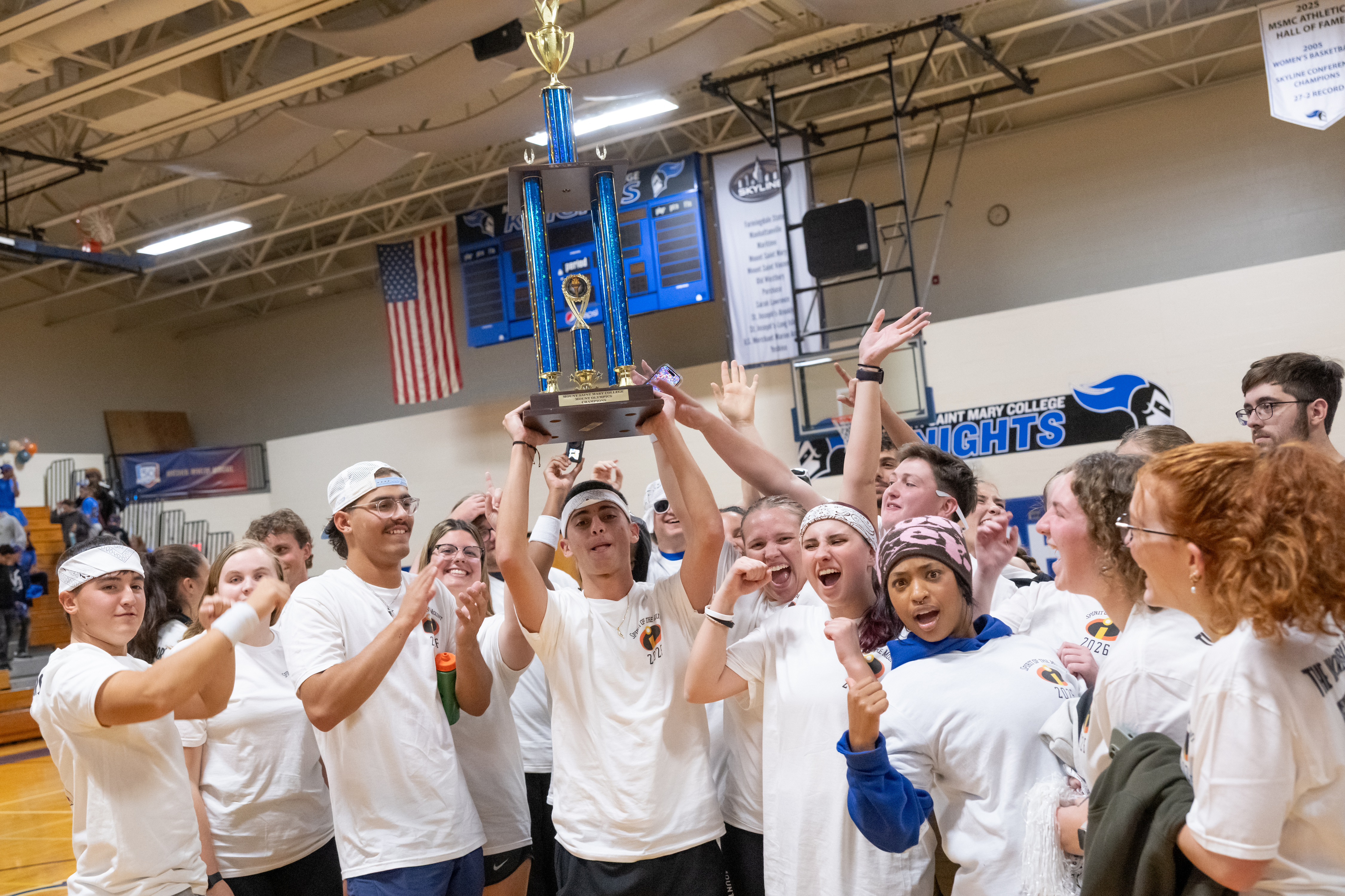 Students holding up a trophy at Mount Olympics