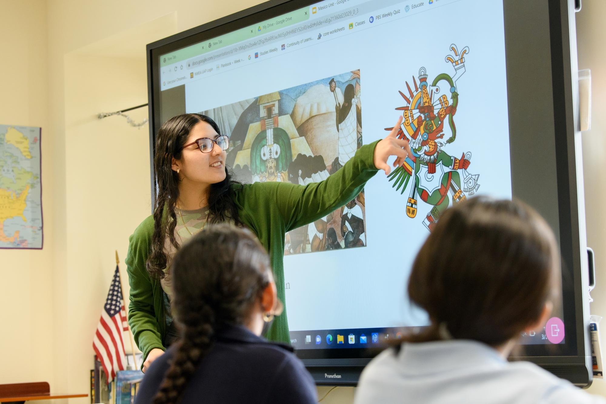Student teacher teaching a class.